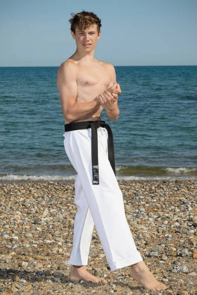 Shirtless Year Old Teenage Black Belt Flexing His Muscles — Stock Fotó