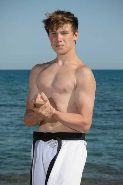 Shirtless Year Old Teenage Black Belt Flexing His Muscles — Stock Fotó