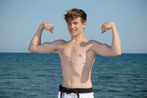 Shirtless Year Old Teenage Black Belt Flexing His Muscles — Stock Photo, Image