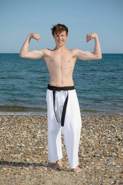 Shirtless Year Old Teenage Black Belt Flexing His Muscles — Fotografia de Stock