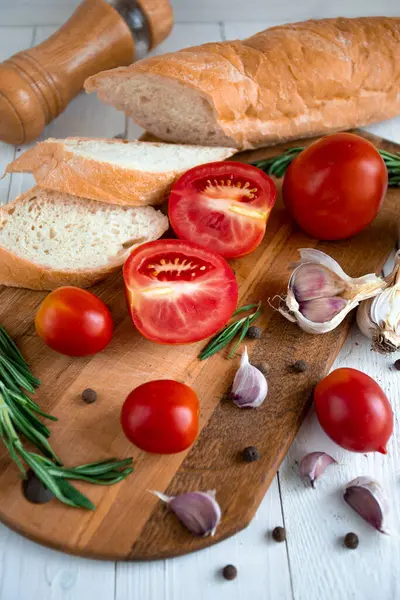 bruschetta with tomatoes and basil on a wooden background. top view.