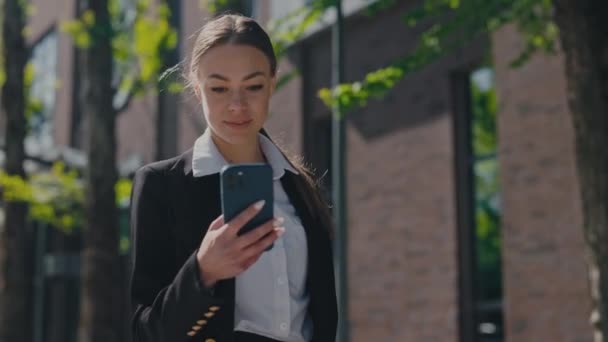 Caucasian Elegant Business Woman Receiving Good News While Checking Emails — Stockvideo