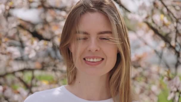 Close Adorable Caucasian Woman Happy Facial Expression Posing Flowering Trees — Wideo stockowe