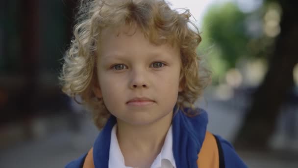 Close Portrait Joyful Schoolboy Standing School Yard Bag Turn Smilling — Stockvideo