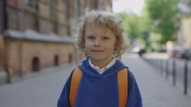 Portrait Male Kid Looking Camera Primary Schoolboy Standing Street School — Stockvideo