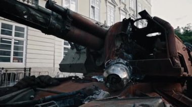 Close-up of caterpillar battle tank turret and armor burned-out Russian tank as a result of the Russian-Ukrainian war.Military battle army war concept