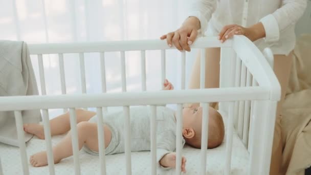 Close View Woman Hands Rocking Baby Cot Newborn Baby Wearing — Stock video