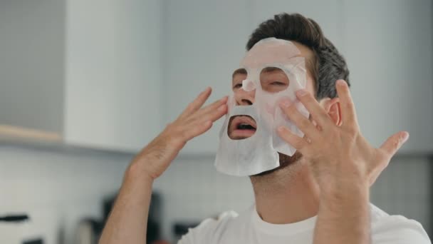 Funny Man Having Fun Home Using Face Mask Better Mood — Vídeo de stock