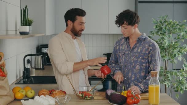 Lgbt Couple New Apartment Kitchen Enjoying Cooking Together Two Gay — Stockvideo