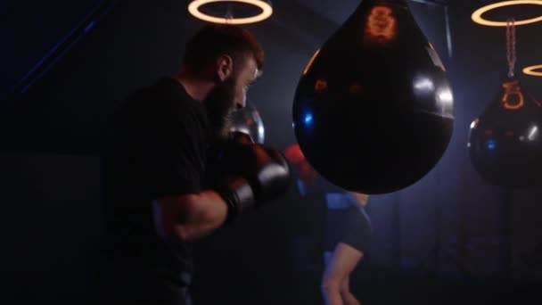 Back View Brutal Caucasian Strong Male Boxer Punching Bag Gym — Stock Video