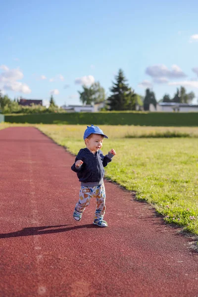 Little Boy Running Athletics Track Koszalin Poland 스톡 이미지