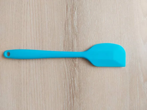 Blue Silicone Spatula Wooden Table Isolated Backgrounds Copyspace Much Space — Stock Photo, Image