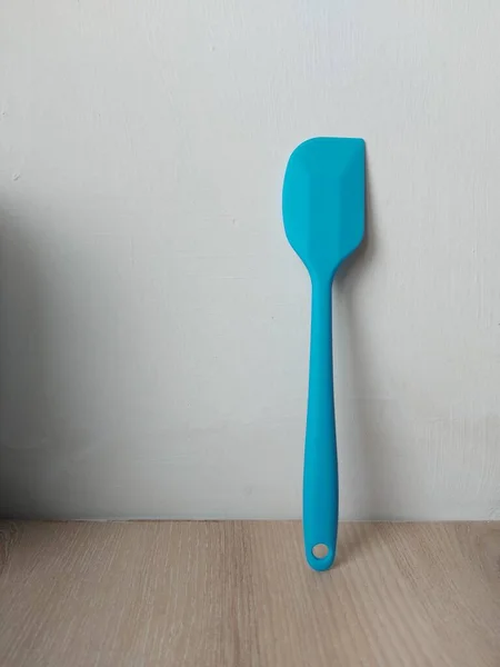 Blue Silicone Spatula Wooden Table Isolated Backgrounds Copyspace Much Space — Stock Photo, Image