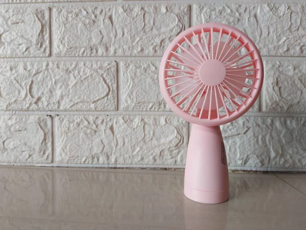 Pink Mini Fan Floor White Wall Background — Stock Photo, Image