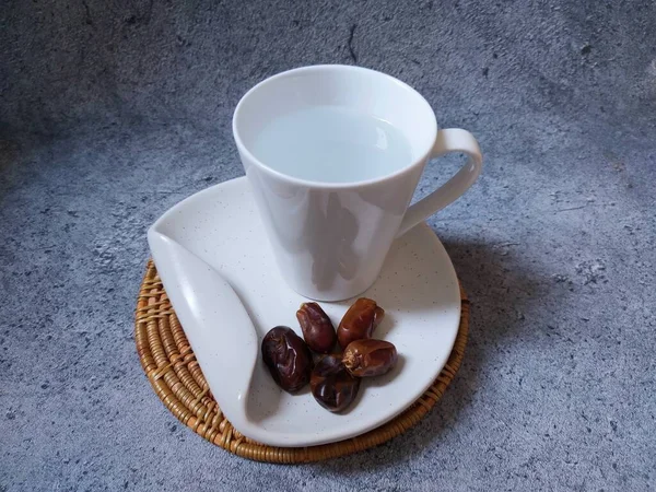 Glass Drinking Water Five Candied Dates White Plate Meal Set — стоковое фото