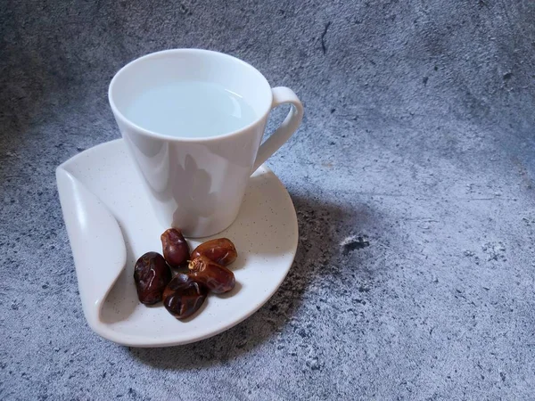 Glass Drinking Water Five Candied Dates White Plate Meal Set — стоковое фото