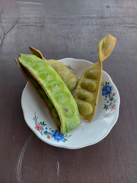 Parkia Speciosa Plate Also Called Thebitter Bean Twisted Cluster Beanorstink — 图库照片