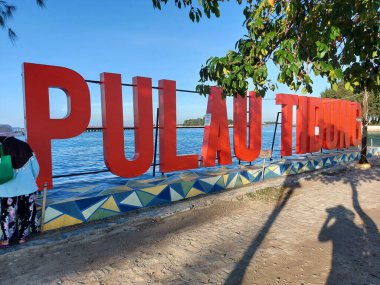 jakarta,indonesia-july 23 2022: name plate of Pulau tidung. one of the most famous tour island in kepulauan seribu,Jakarta, Indonesia. 