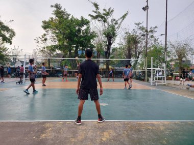 Karawang,indonesia-august 2 2022: Volleyball practice atmosphere on an outdoor court