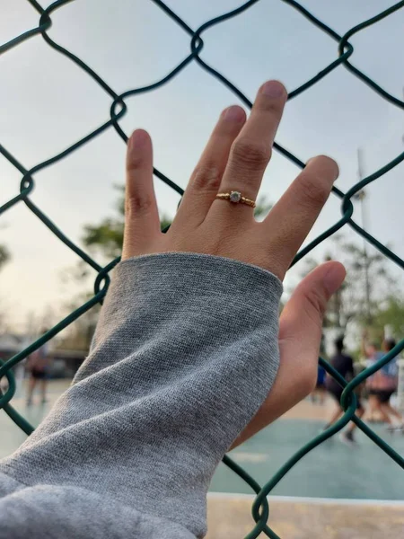 Woman Hand Blocked Wire Mesh Fence — Stock Photo, Image