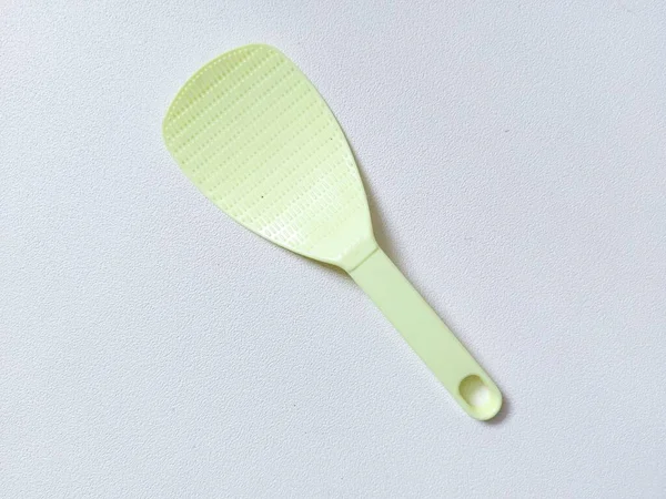 Green Rice Scoop Paddle Spatula Isolated Background White Copyspace Minimalist — Stock Photo, Image