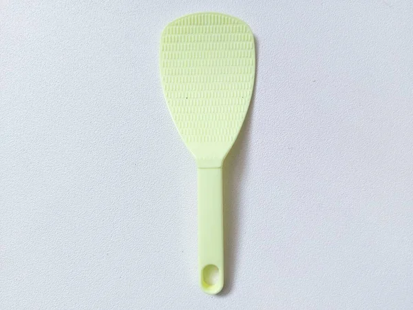Green Rice Scoop Paddle Spatula Isolated Background White Copyspace Minimalist — Stock Photo, Image