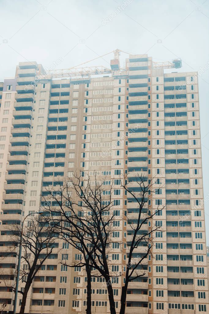 empty apartment house high rise building construction background - crisis in real estate property sector