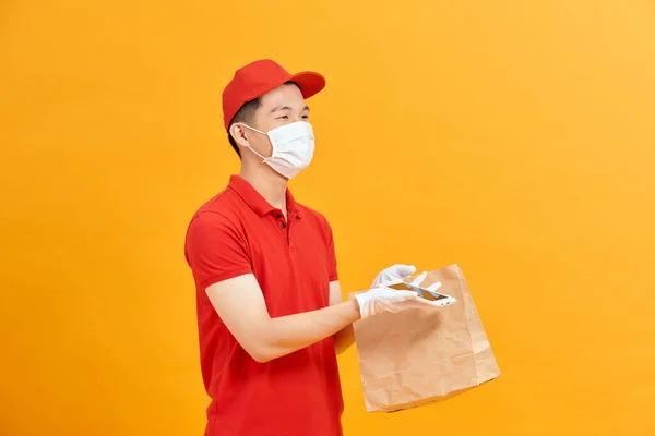 Delivery Man Holding Paper Bag Food White Background Food Delivery — Stock Photo, Image