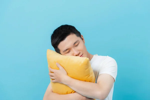 Handsome Man Hugging Pillow Light Blue Background — Stock Photo, Image