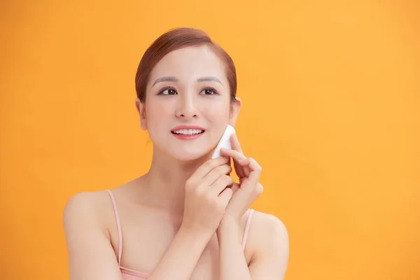 Smiling Pretty Young Woman Cleaning Her Face Using Cotton Pads — Stock Fotó