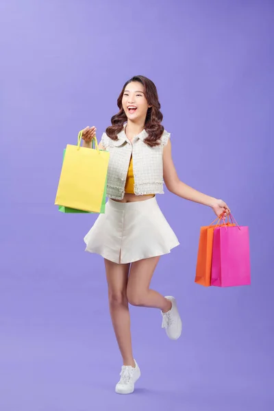 Attractive Happy Stylish Woman Shopaholic Running Holding Shopping Bags Purple — Fotografia de Stock