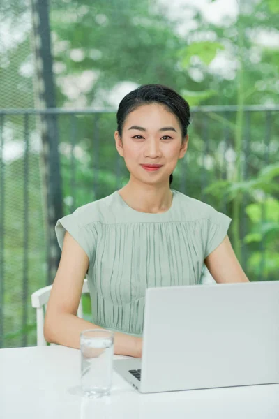 picture of happy woman with laptop computer