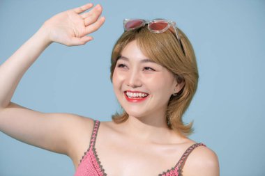Close up photo of pretty optimistic lady raising hands up having free freedom inspiration isolated blue background