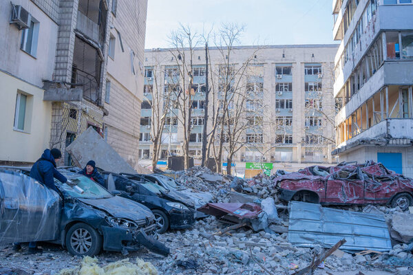 Kyiv, Ukraine - March 9, 2022: Damaged multi-storey building in Kyiv, the consequences of Russian missile attacks in the capital of Ukraine. War and aggression of Russia against Ukraine.