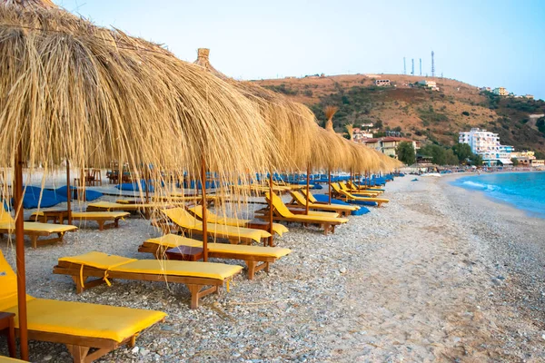 Straw Beach Umbrellas Comfortable Sun Loungers Sand Pebble Beach Himare — Stock Photo, Image