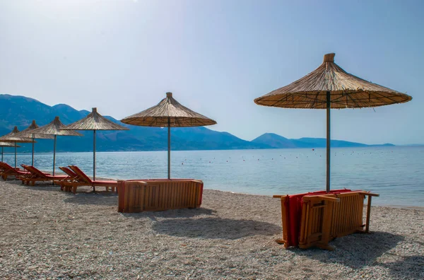 Beach Umbrellas Sun Loungers Pebble Beach Qeparo Village Albania Ionian — стоковое фото