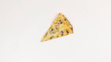 One slice of pizza on white background. Copy scace. Close up. Popular delicious food concept.
