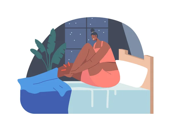 Mulher usa pijama sentada na cama sentando dor no tornozelo, personagem feminina com problemas de sono, cãibras, músculos fracos — Vetor de Stock
