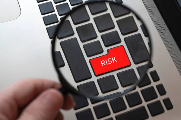 risk lettering on red key on computer keyboard.risk concept idea