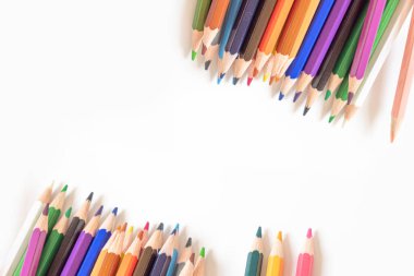 Colored pencils isolated on white background.Education, kindergarten concept. Idea of pedagogy concept.view from the top.