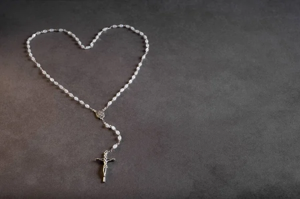 Prayer. Jesus. The beads