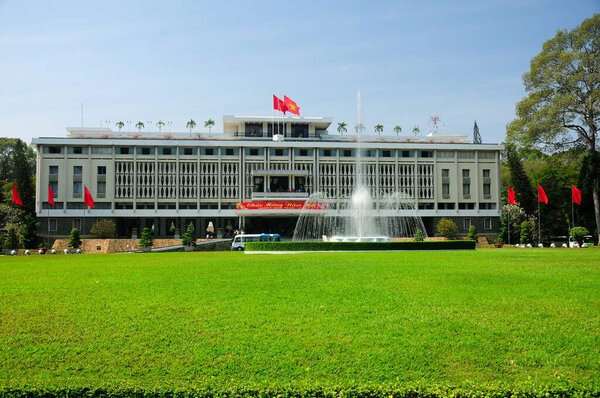 The Independence Palace entrance, water fountain and front lawn located in Ho Chi Minh City (Saigon) Vietnam during the new year celebration.