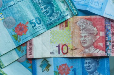Renkli Malezya ringgit para soyut arkaplan farklı mezhepler. 