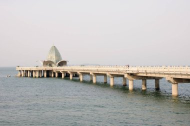Dongshan Pier in Yantai China in Zhifu Bay clipart