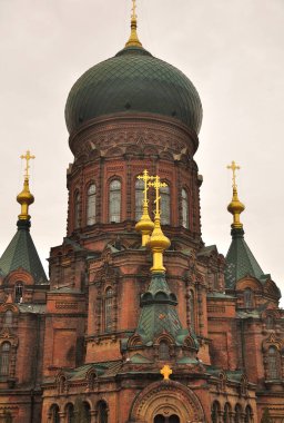 Saint Sophia Cathedral in Harbin Heilongjiang province China on an overcast gray sky day.  
