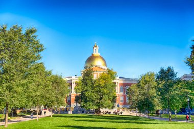 October 31, 2018. Boston, Massachusetts. The Massachusetts state house located on the Boston Commons in Boston Massachusetts in the morning sunlight. 