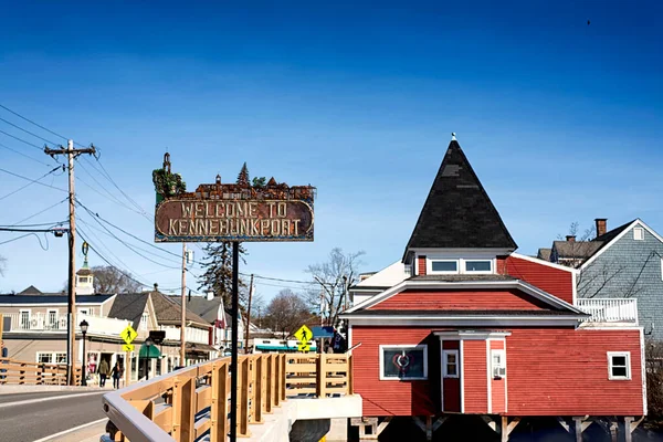 The Kennebunkport sign located on a bridge crossing the Batson River on a cold sunny winter day in New England. 