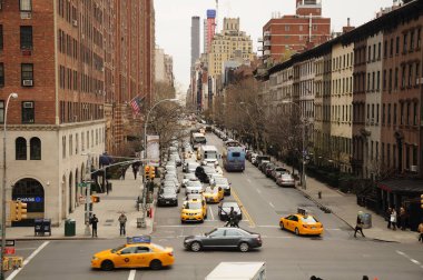 New York City, New York. March 19, 2016. The busy streets of New York City as seen from the High Line rail park near the meat packing district.  