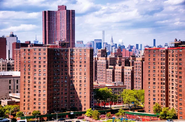 Brick apartment buildings in lower Manhattan in New York City, New York on an overcast day.