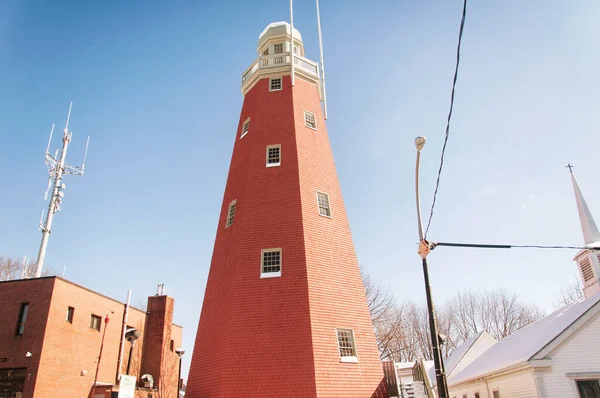 The national historic landmark Portland Observatory in Portland Maine on an sunny blue sky day.